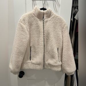 Super cute and warm fuzzy jacket, perfect for cold days! Size medium, fits small